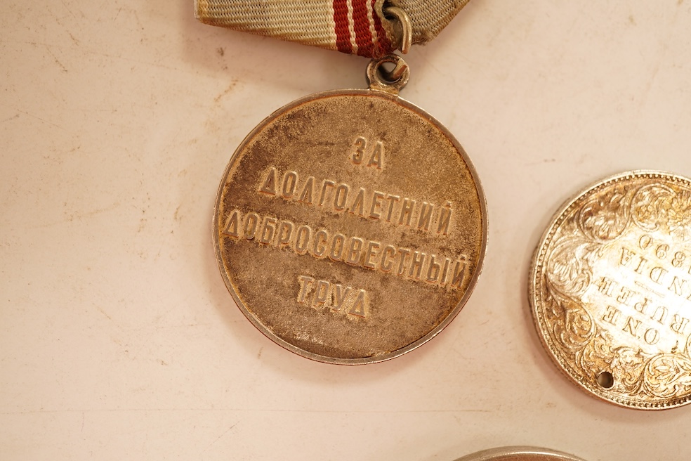 World coins, Victoria, 1891 crown, mounted with chain, Austria, Maria Theresa Thaler, mounted, CCCP medal award, a pierced one rupee India eighteen ninety and a novelty yes no fantasy coin.